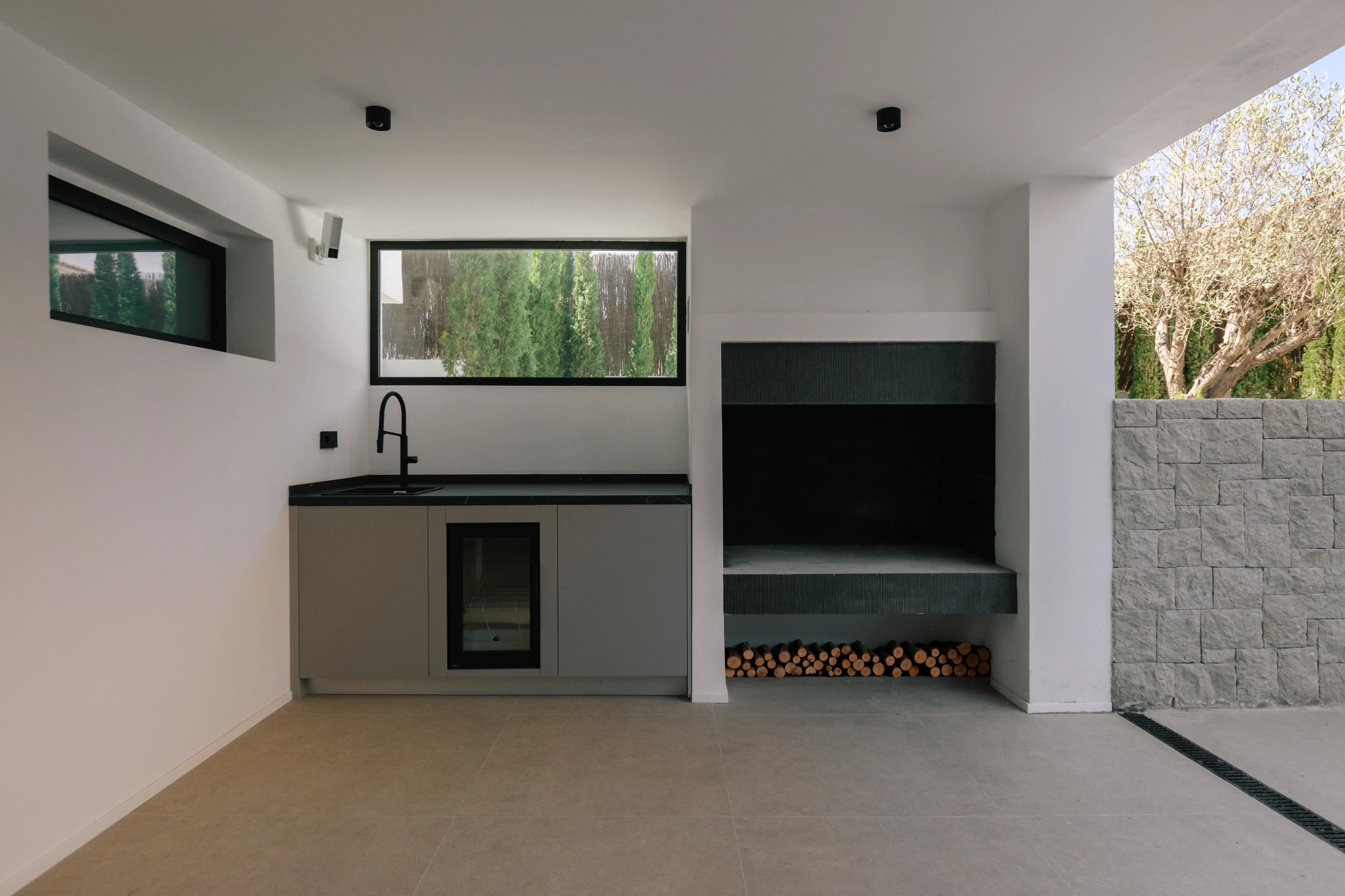 Outdoor terrace and pool area after ремонт виллы in Campolivar Валенсия image 72