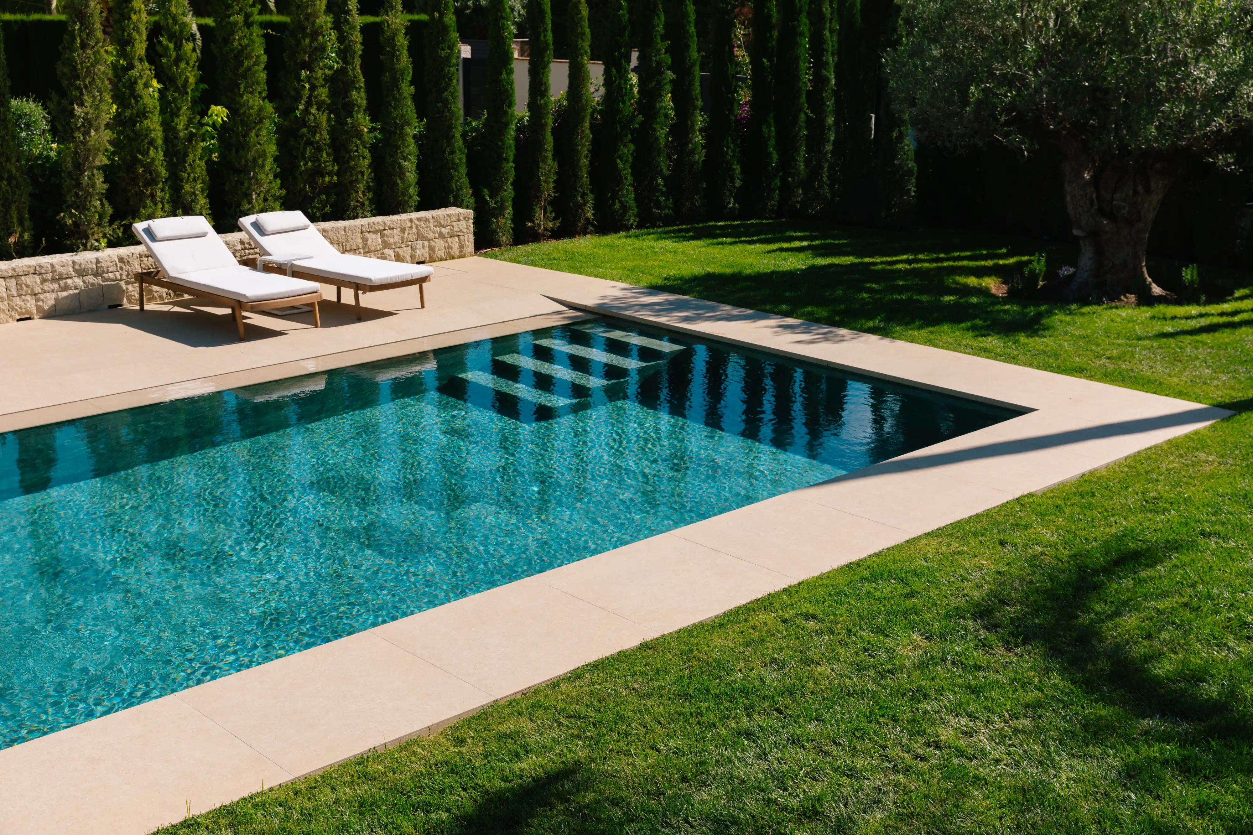 Outdoor terrace and pool area after ремонт виллы in Campolivar Валенсия image 77