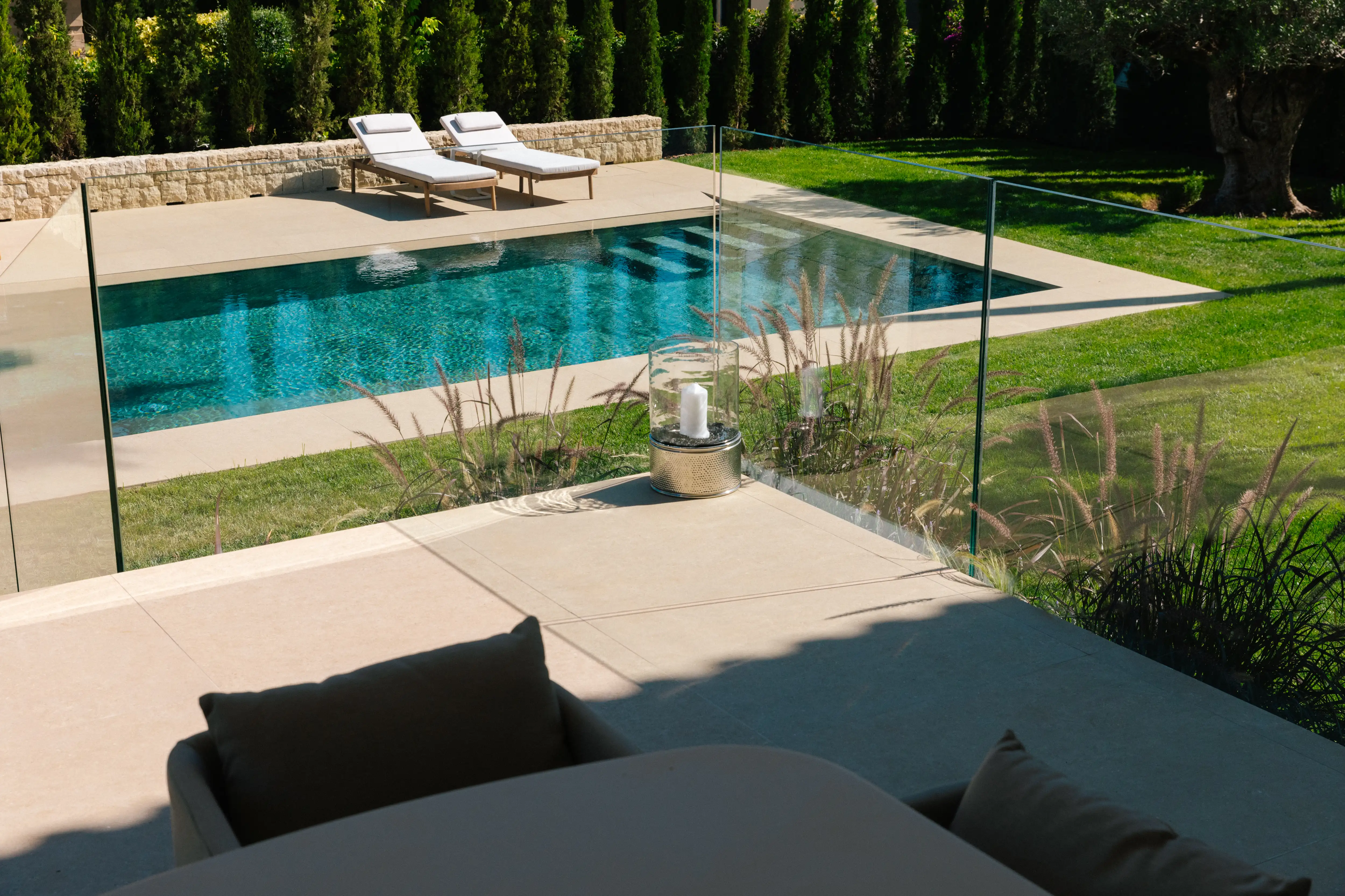 Outdoor terrace and pool area after ремонт виллы in Campolivar Валенсия image 81