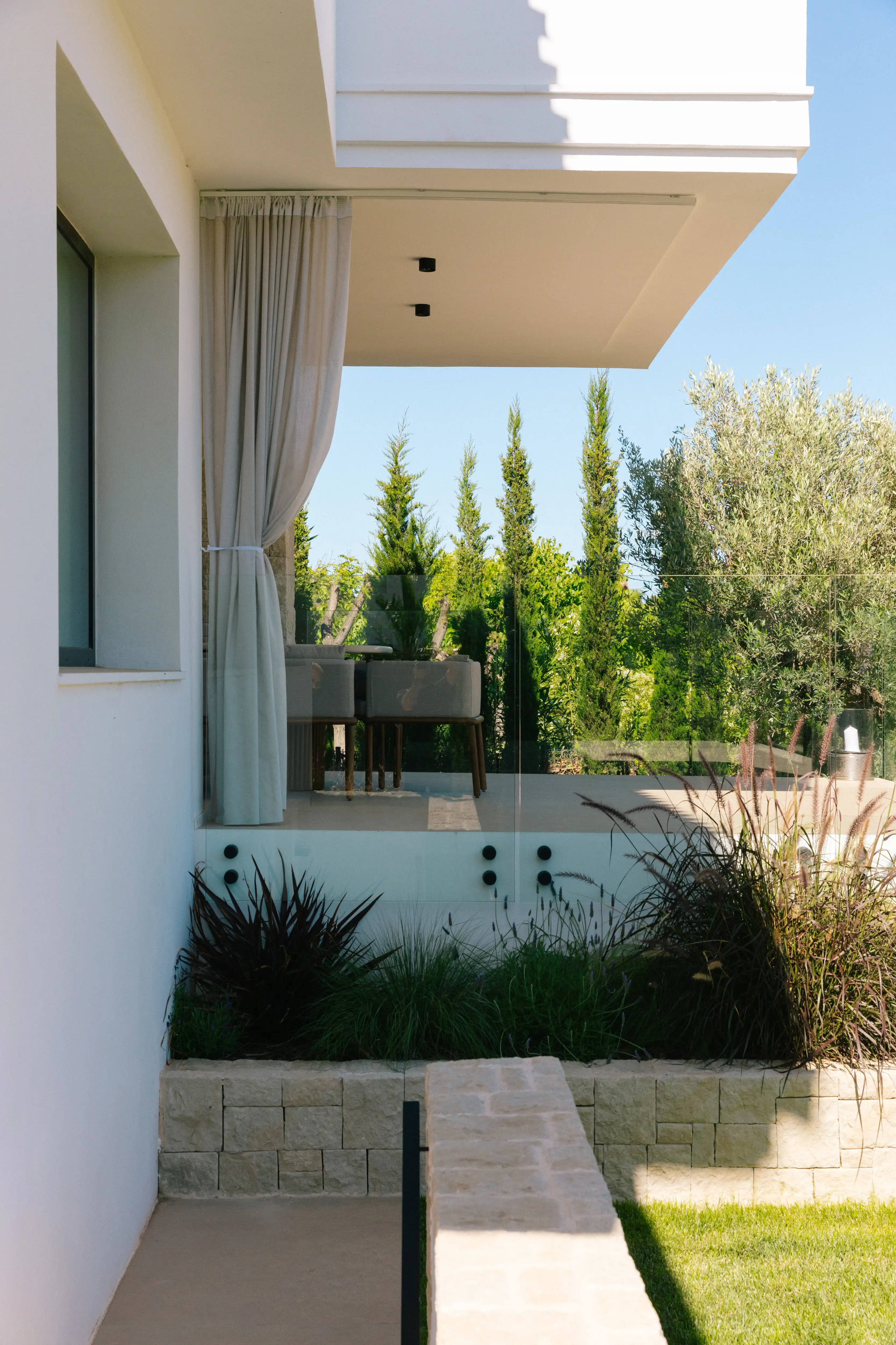 Outdoor terrace and pool area after ремонт виллы in Campolivar Валенсия image 83